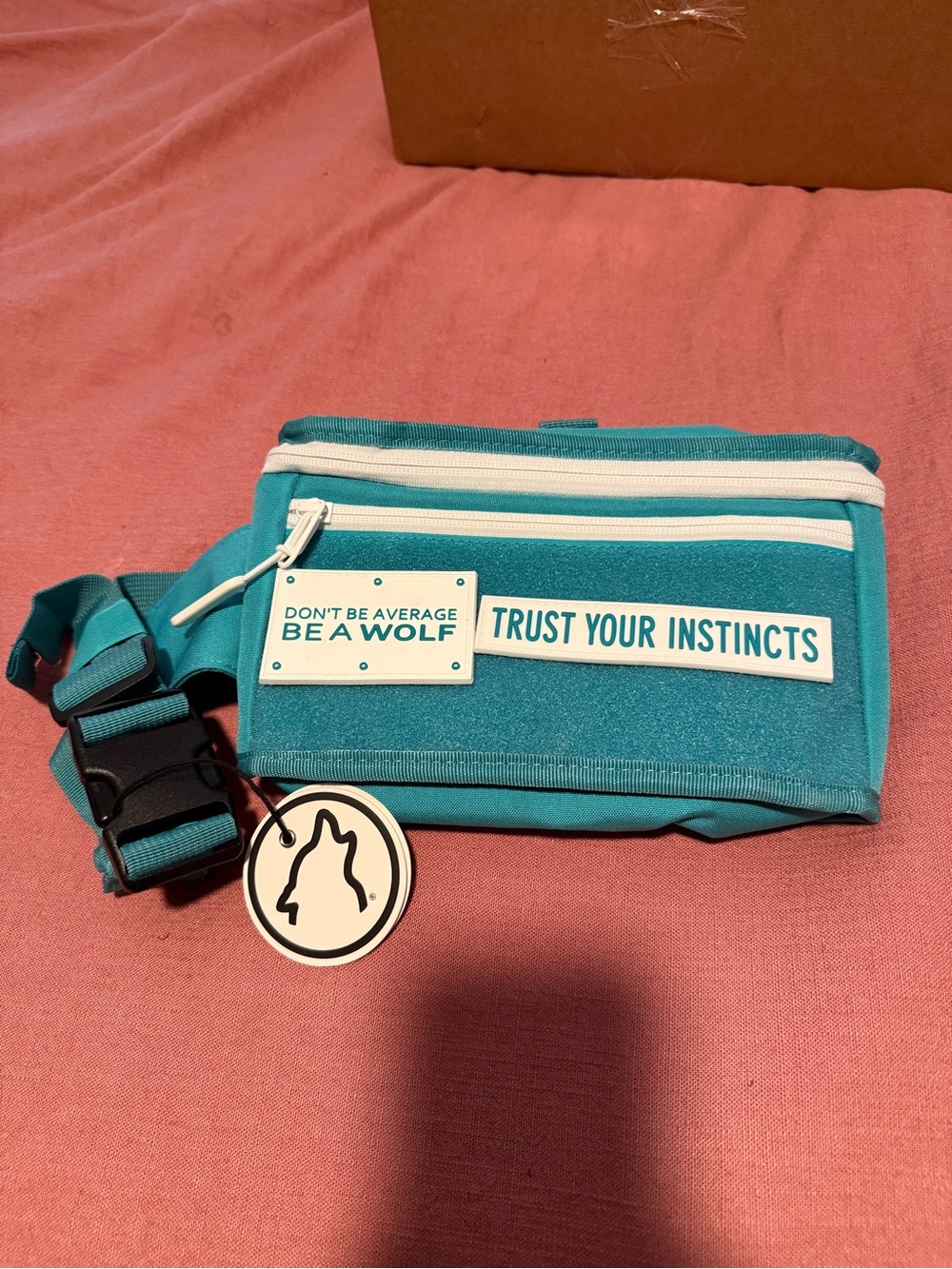 Wolfpak Fanny Pak. Aqua and white